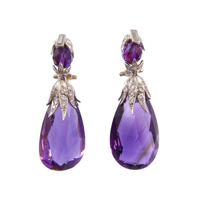 Pair of amethyst drop and diamond pendant earrings, hung each with a principal briolette cut amethyst drop | MasterArt